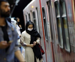 epa08477013 An Iranian woman wearing face mask takes a train in a subway station in Tehran, Iran, 10 June 2020. Media reported that according to the last report by the health ministry the spread of novel coronavirus (Covid-19) is growing up while in past 24 hours 2011 new cases have been diagnosed and 84 people died. Iranian health ministry warned people to don’t use subways as much as they can.  EPA/ABEDIN TAHERKENAREH