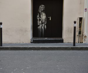 epa08477356 (FILE) - A recent artwork believed to be attributed to Banksy is of a woman veiled in mourning next to the Bataclan concert venue in Paris, France, 26 June 2018 (re-issued on 10 June 2020).  According to media reports, on 10 June 2020 the door, stolen from the Bataclan, was found by the Italian Carabineri in a farmhouse near Teramo, Abruzzo. The door to the emergency exit of the local in Paris where on 13 November 2015 the terrorists raided the theater during an Eagles of Death Metal concert and killed 90 people, was stolen on 26 January 2019.  EPA/JULIEN DE ROSA *** Local Caption *** 54442063