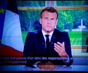epa08485503 A camera screen displays the French President Emmanuel Macron speech addressing the nation from the Elysee Palace in Bois-Colombes, near Paris, France, 14 June 2020.  EPA/CHRISTOPHE PETIT TESSON