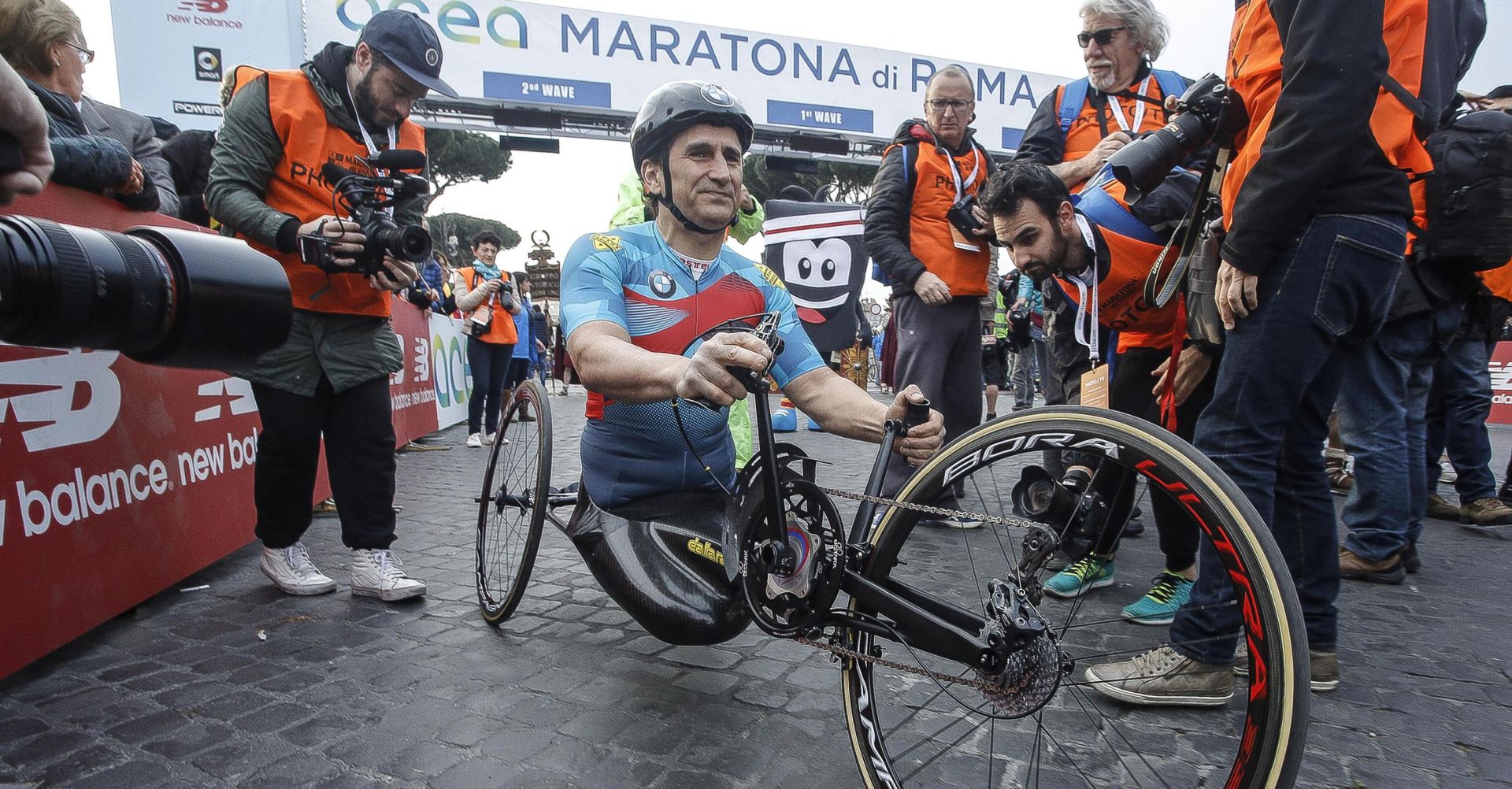 epa08497149 (FILE) - Italian professional racing driver and paracyclist Alex Zanardi prepares for the start of the 23rd edition of the Rome Marathon (Maratona die Roma) in the centre of Rome, Italy, 02 April 2017 (reissued 20 June 2020). Reports on 20 June 2020 state four-time paralympic champion and former Formula One driver Alex Zanardi was involved in a serious road accident on 19 June 2020 in the province of Siena while taking part in a race on his handbike during one of the stages of the relay of Obiettivo tricolore. Zinardi underwent a brain surgery after suffering a severe cranial trauma and is in serious condition, according to reports.  EPA/GIUSEPPE LAMI *** Local Caption *** 53432249