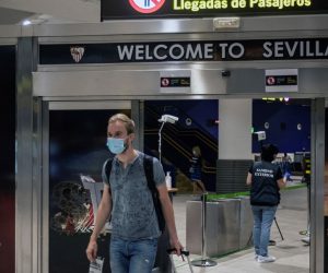 epa08500131 A traveler from the Netherlands wears a face mask as he arrives at the airport in Seville, aboard the first tourist flight after lifting the State of Emergency and lockdown to stop the spread of the coronavirus, in Seville, Andalusia, Spain, 21 June 2020. Spanish airports on the same day received travelers from the European Union and the Schengen space after being closed for about three months amid the coronavirus pandemic.  EPA/JOSE MANUEL VIDAL