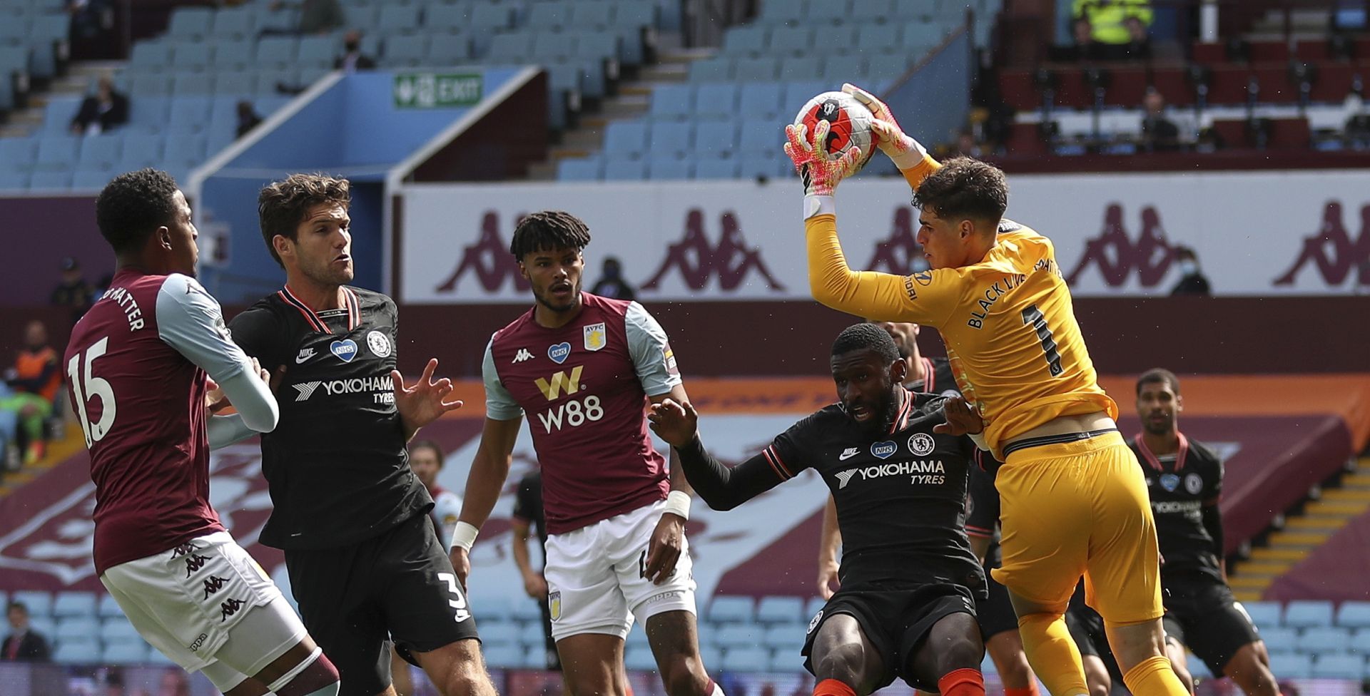 epa08500670 Chelsea goalkeeper Kepa Arrizabalaga (R) makes a save during the English Premier League soccer match between Aston Villa and Chelsea FC in Birmingham, Britain, 21 June 2020.  EPA/CATHERINE IVILL / NMC / GETTY IMAGES POOL EDITORIAL USE ONLY. No use with unauthorized audio, video, data, fixture lists, club/league logos or 'live' services. Online in-match use limited to 120 images, no video emulation. No use in betting, games or single club/league/player publications.