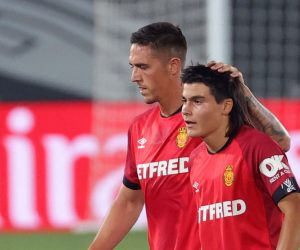 epa08507468 Mallorca's midfielder Luka Romero (R), the youngest player of Spanish League history at fifteen years-old, at the end of the Spanish LaLiga soccer match between Real Madrid and RCD Mallorca played at Alfredio Di Stefano stadium in Madrid, Spain, 24 June 2020.  EPA/JUANJO MARTIN