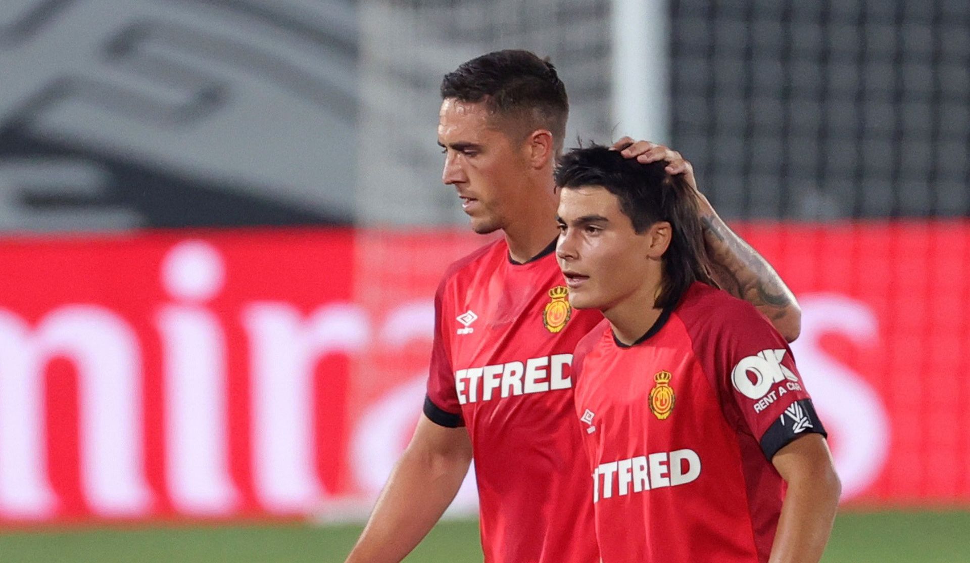 epa08507468 Mallorca's midfielder Luka Romero (R), the youngest player of Spanish League history at fifteen years-old, at the end of the Spanish LaLiga soccer match between Real Madrid and RCD Mallorca played at Alfredio Di Stefano stadium in Madrid, Spain, 24 June 2020.  EPA/JUANJO MARTIN