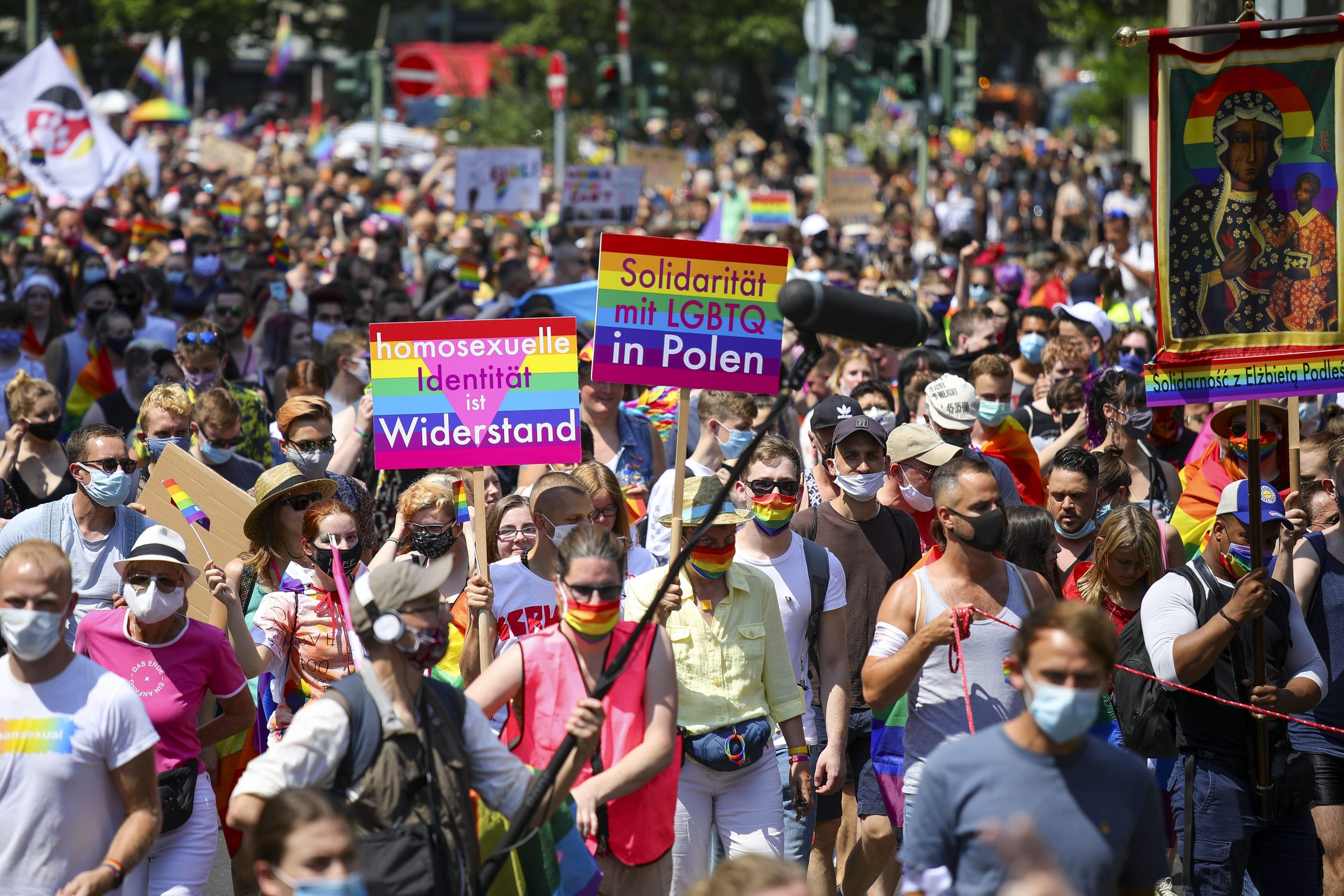 epa08511622 People take part in the 'Pride Berlin' demonstration in Berlin, Germany, 27 June  2020. A large crowd marched under the motto 'Save our Community, Save our Pride' in solidarity with the hardships of the German capital's LGBTIQ community but also in Poland, Russia, Ukraine. Berlin's world famous pride parade, Christopher Street Day (CSD) which was scheduled to take place end of July was cancelled this year due to the Coronavirus pandemic.  EPA/OMER MESSINGER