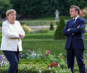 epa08516188 German Chancellor Angela Merkel (L) and French President Emmanuel Macron talk during a bilateral meeting at the German government's guest house Meseberg Castle in Gransee near Berlin, Germany, 29 June 2020. The meeting takes place ahead of Germany's EU Council Presidency in the second half of 2020.  EPA/HAYOUNG JEON / POOL
