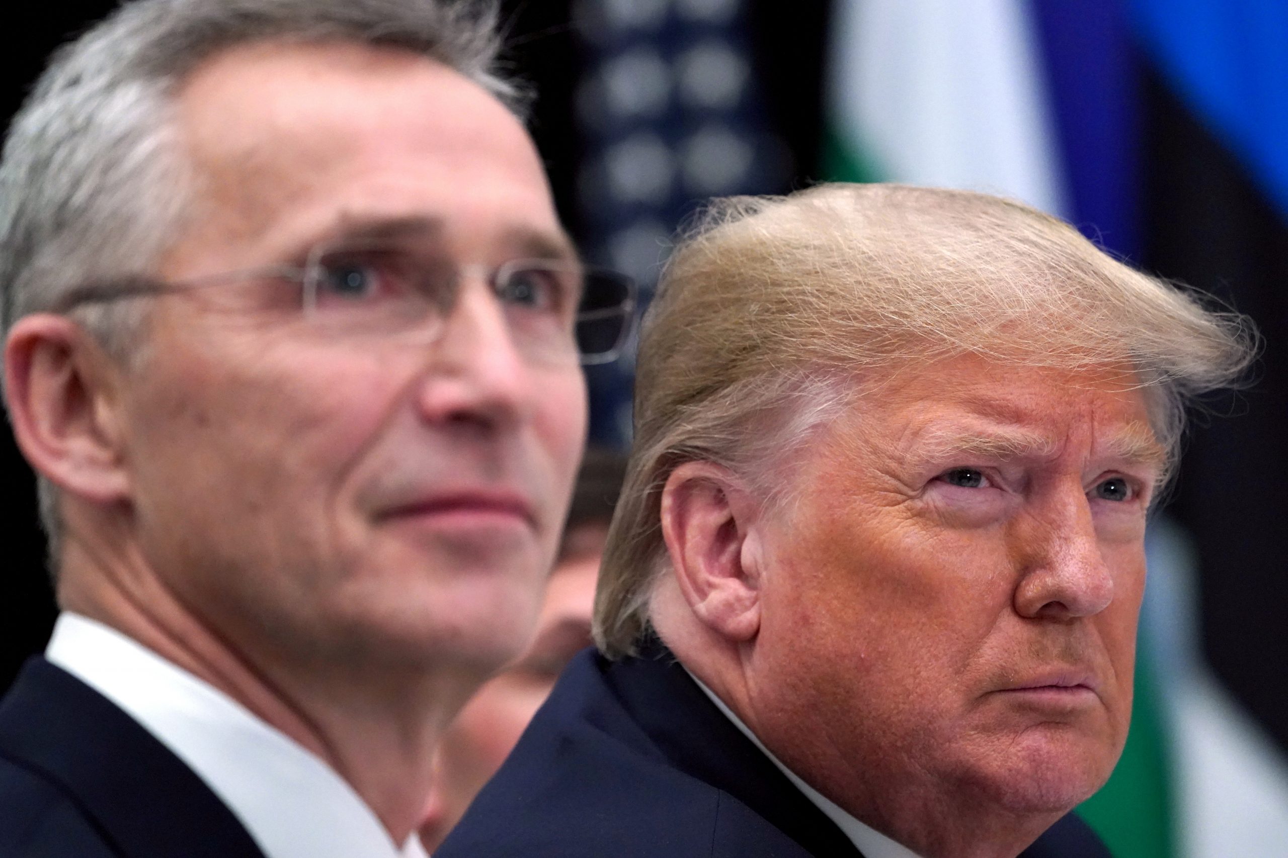 FILE PHOTO: NATO Alliance summit in Watford FILE PHOTO: U.S. President Donald Trump reacts next to NATO Secretary General Jens Stoltenberg as they attend a working lunch during the NATO leaders summit in Watford, Britain, December 4, 2019. REUTERS/Kevin Lamarque/File Photo Kevin Lamarque