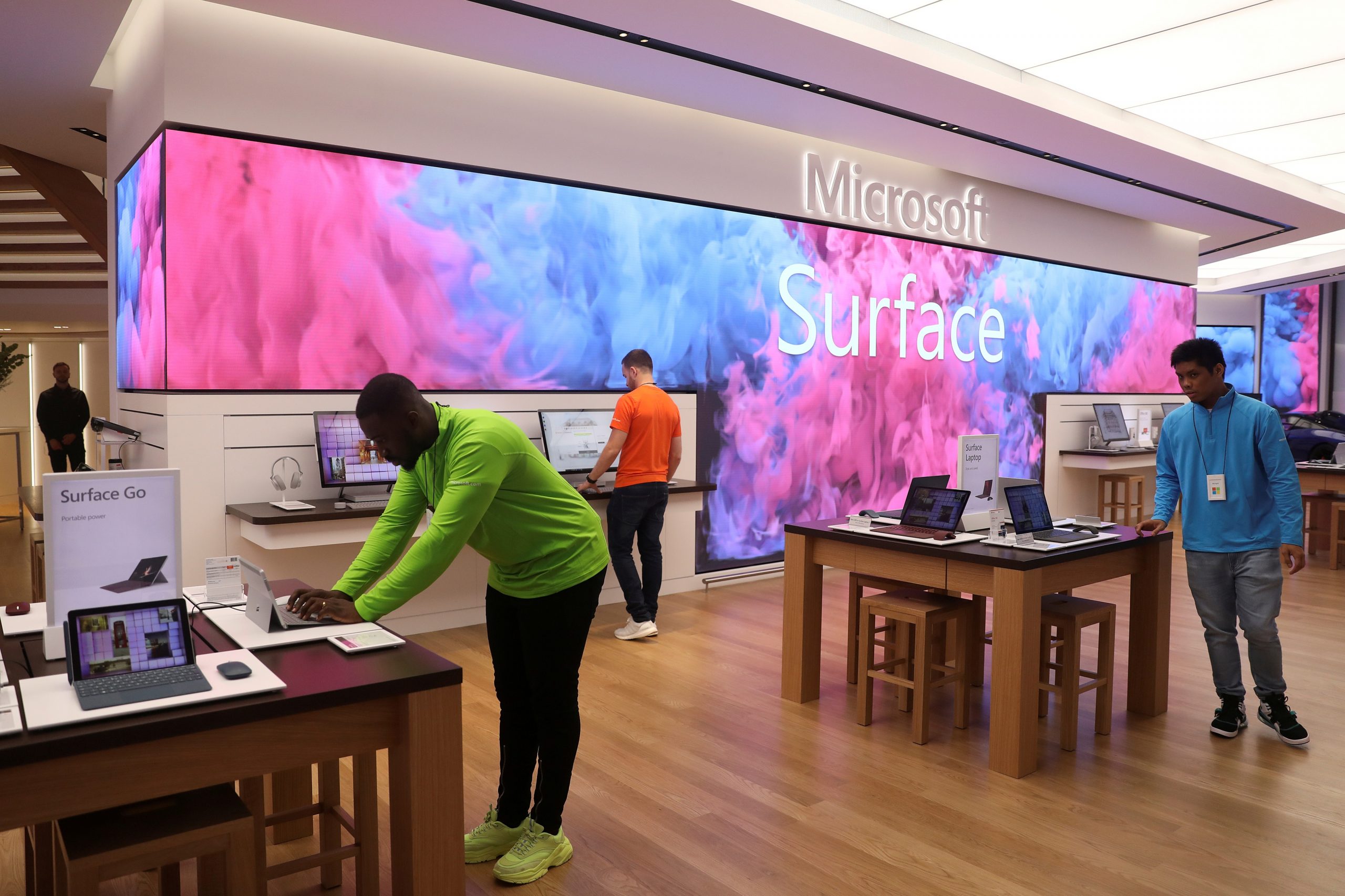 FILE PHOTO: Employees work at Microsoft's new Oxford Circus store ahead of its opening in London FILE PHOTO: Employees work at Microsoft's new Oxford Circus store ahead of its opening in London, Britain July 9, 2019.   REUTERS/Simon Dawson/File Photo  GLOBAL BUSINESS WEEK AHEAD Simon Dawson