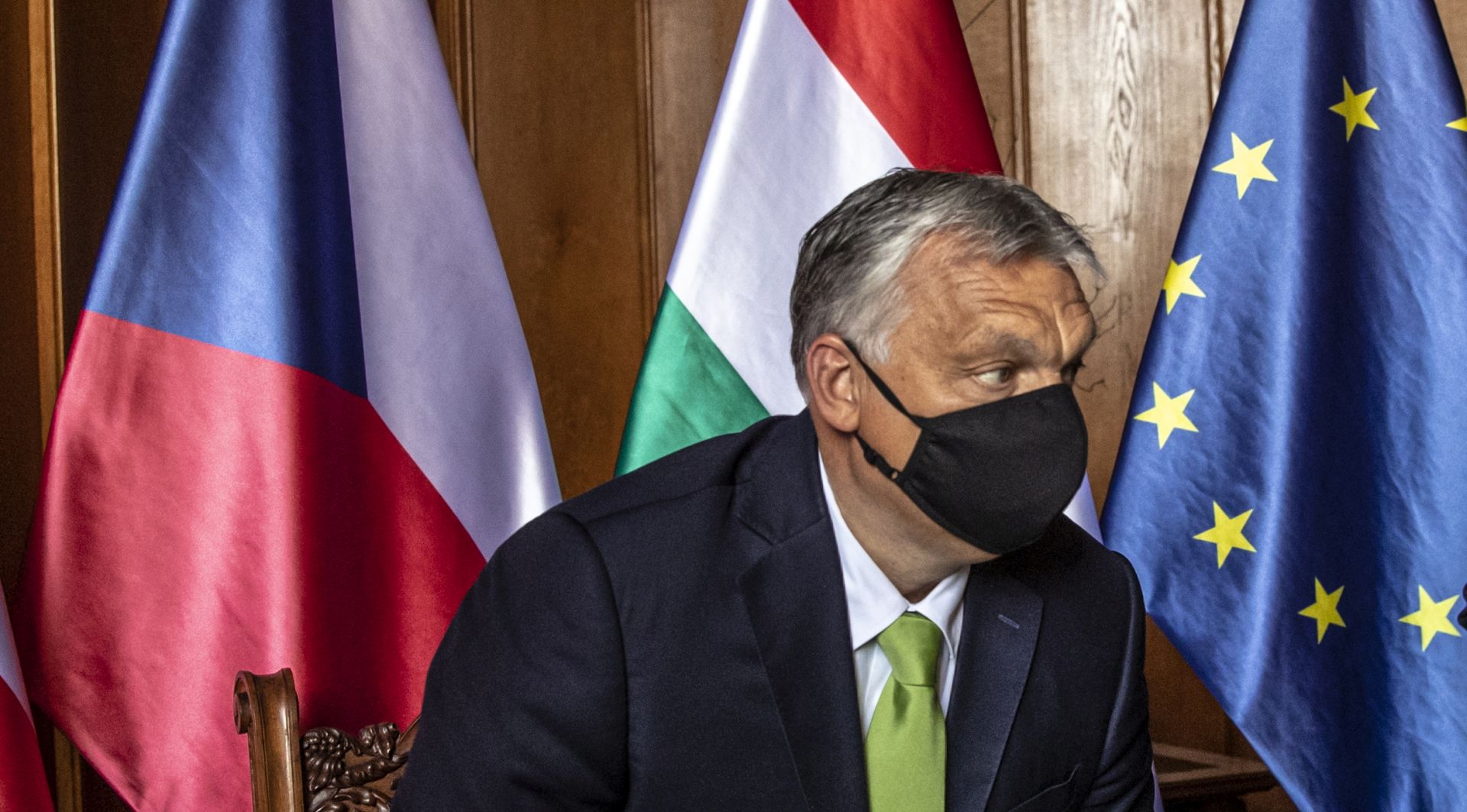 epa08478707 Hungarian Prime Minister Viktor Orban wearing protective face mask during the Visegrad Group (V4) summit at Lednice Chateau in Lednice, Czech Republic, 11 June 2020.  EPA/MARTIN DIVISEK