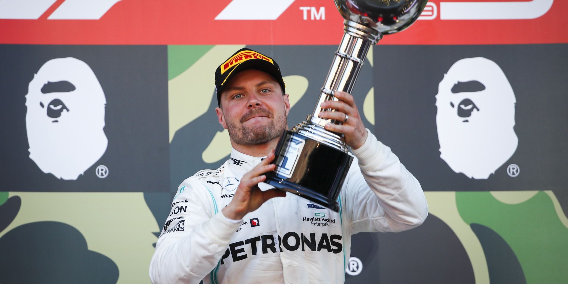 epa08480439 (FILE) -  Finnish Formula One driver Valtteri Bottas of Mercedes AMG GP celebrates on the podium with his trophy after winning the Japanese Formula One Grand Prix in Suzuka, Japan, 13 October 2019 (re-issued on 12 June 2020). On 12 June 2020 the FIA (Federation Internationale de l'Automobile) announced that the 2020 Formula One Grand Prix of Japan, as well of the Azerbaijan Grand Prix and Singapore Grand Prix have been cancelled 'As a result of the ongoing challenges presented by COVID-19'.  EPA/DIEGO AZUBEL *** Local Caption *** 55544199