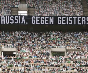 epa08488752 A banner is seen in the stands saying 'Football without fans is nothing' (bottom) prior to the Bundesliga match between Borussia Moenchengladbach and VfL Wolfsburg at Borussia-Park in Moenchengladbach, Germany, 16 June 2020.  EPA/ALEX GRIMM / POOL DFL regulations prohibit any use of photographs as image sequences and/or quasi-video.