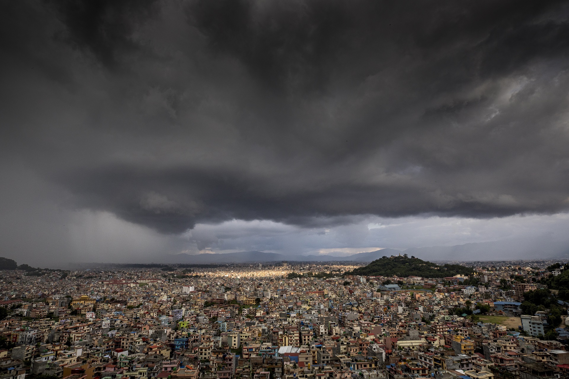 epa08490693 Monsoon clouds gather over Kathmandu, Nepal, 17 June 2020. The monsoon season in Nepal normally begins in mid-June and ends mid-September every year.  EPA/NARENDRA SHRESTHA