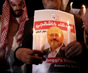 epa08522788 (FILE) - A protestor (L) wears a mask of Saudi Crown Prince Mohammad Bin Salman with a red painted hands while others hold images of Saudi journalist Jamal Khashoggi    during a demonstration in front of Saudi Arabian consulate in Istanbul, Turkey, 25 October 2018 (reissued 02 July 2020). Turkey will hold on 03 July 2020 a trial in absentia for 20 suspects, including two former aides to Saudi Crown Prince Mohammed bin Salman (MBS), for the murder of journalist Jamal Khashoggi in October 2018, according to media reports.  EPA/ERDEM SAHIN *** Local Caption *** 55726496