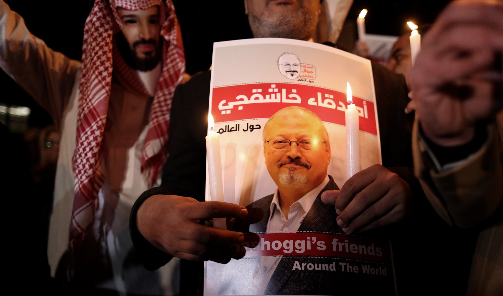 epa08522788 (FILE) - A protestor (L) wears a mask of Saudi Crown Prince Mohammad Bin Salman with a red painted hands while others hold images of Saudi journalist Jamal Khashoggi    during a demonstration in front of Saudi Arabian consulate in Istanbul, Turkey, 25 October 2018 (reissued 02 July 2020). Turkey will hold on 03 July 2020 a trial in absentia for 20 suspects, including two former aides to Saudi Crown Prince Mohammed bin Salman (MBS), for the murder of journalist Jamal Khashoggi in October 2018, according to media reports.  EPA/ERDEM SAHIN *** Local Caption *** 55726496