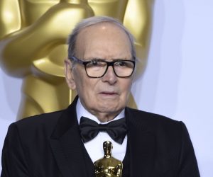 epa08530054 (FILE) - Italian composer Ennio Morricone holds the Oscar for Best Original Score for 'The Hateful Eight' in the press room during the 88th annual Academy Awards ceremony in Hollywood, California, USA, 28 February 2016 (reissued 06 July 2020). Italian composer Ennio Morricone died on 06 July 2020 at the age of 91.  EPA/PAUL BUCK