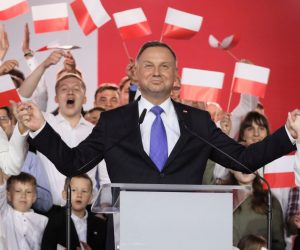 epa08542449 Incumbent President Andrzej Duda (C) with his wife Agata Kornhauser-Duda (L) and daughter Kinga Duda (R) gives statement after initial exit polls in Polish Presidential elections in Pultusk, Poland, 12 July 2020. According to initiall exit polls, Polish President Andrzej Duda has won percent 50.4 percent of votes and Civic Coalition candidate and Mayor of Warsaw Rafal Trzaskowski has won 49.6 percent of votes in the second round of presidential elections in Poland.  EPA/LESZEK SZYMANSKI POLAND OUT