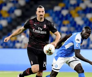epa08542517 Milan's forward Zlatan Ibrahimovic (L) and  Napoli's defender Kalidou Koulibaly  in action during the Italian Serie A  soccer  match SSC Napoli vs  AC Milan at the San Paolo stadium in Naples, Italy, 12 July 2020.  EPA/CIRO FUSCO