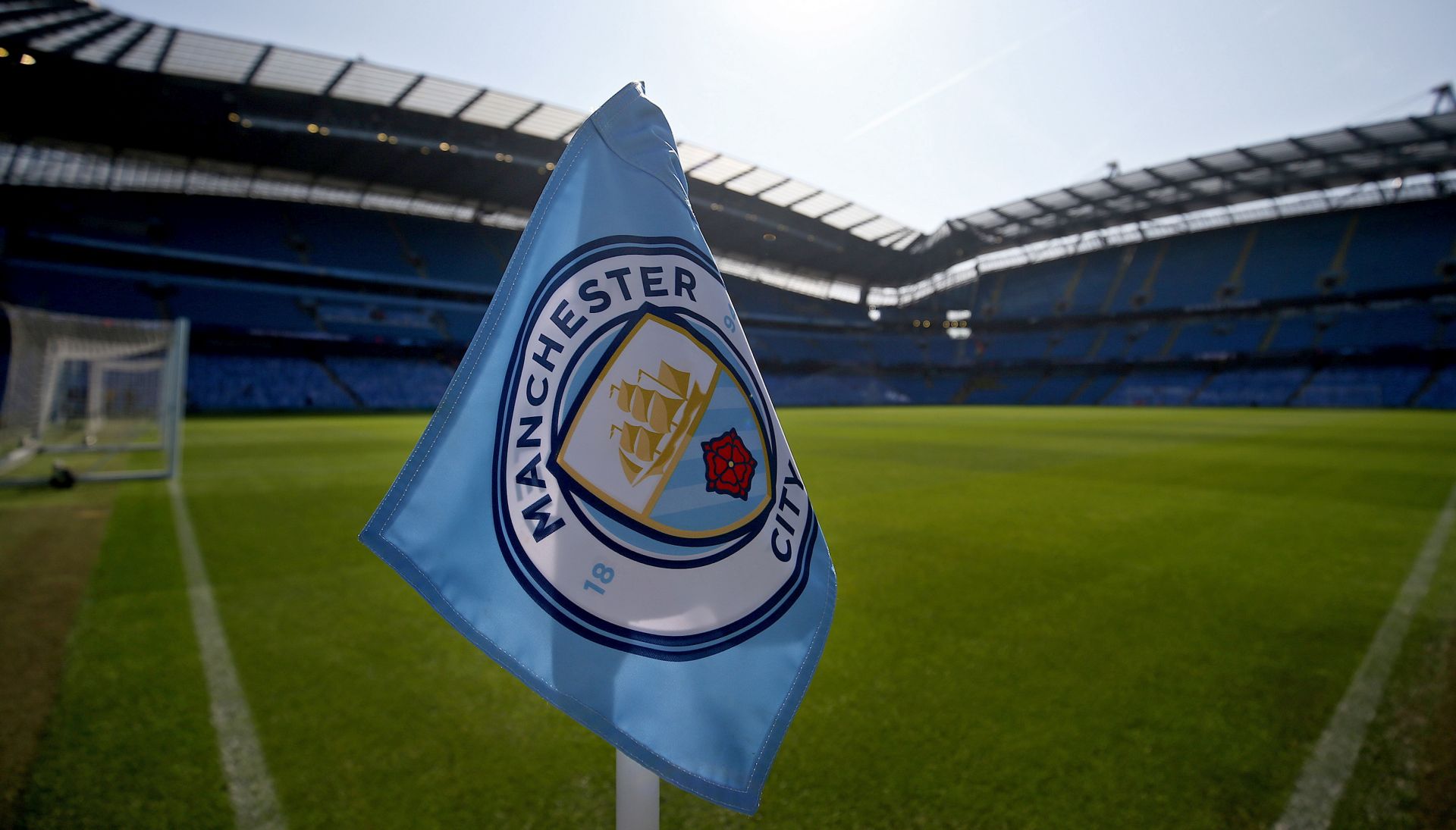 epa08543103 (FILE) - The corner flag is backdropped by a general view of the Etihad stadium ahead of the English Premier League soccer match between Manchester City and Tottenham Hotspur at the Etihad Stadium in Manchester, Britain, 20 April 2019 (reissued 13 July 2020). The international Court of Arbitration for Sport (CAS) on 13 July 2020 lifted the two-year Champions League ban for English Premier League side Manchester City. Manchester City was banned by the UEFA from the Champions League for the two seasons for having broken financial fair play rules.  EPA/Nigel Roddis EDITORIAL USE ONLY. No use with unauthorized audio, video, data, fixture lists, club/league logos or 'live' services. Online in-match use limited to 120 images, no video emulation. No use in betting, games or single club/league/player publications. *** Local Caption *** 55137036