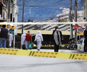 epa08544169 View of a tape to cordon off a street in the San Cristobal borough, one of the sectors that is on orange alert and strict quarantine due to the COVID-19 infections, in Bogota, Colombia, 13 July 2020. The Colombian capital, the main focus of COVID-19 in the country, returns this Monday to a strict but staggered quarantine in most of its neighborhoods to try to contain the pandemic, which infects more than two thousand people daily in the city.  EPA/Carlos Ortega