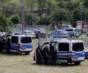 epa08545585 German police cars stand for searching for a man armed with knives and pistols in a forest area north of Oppenau near Offenburg, Germany, 14 July 2020. According to the police, the suspect, who disarmed two police officers, is a 31-year-old German who has no fixed abode and lives in an Oppenau forest area. A squad of police dogs is on duty, and the Special Operations Command (SEK) is also on the scene armed with machine guns.  EPA/RONALD WITTEK