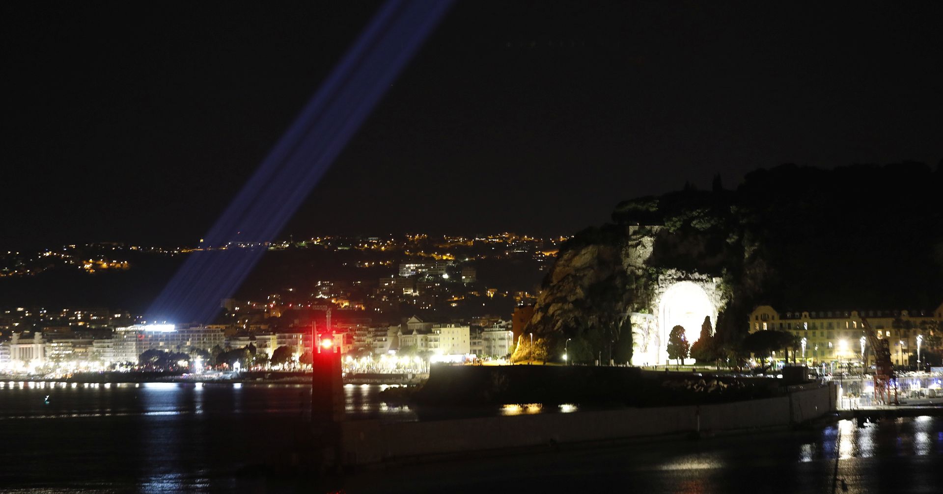 epa08546372 View of the 86 tribute lights on the Promenade des Anglais during the commemorative ceremony marking the anniversary of the 2016 terror attack in Nice, France, 14 July 2020. Eighty-six people died, and many were wounded when a truck drove into the crowd on the Promenade des Anglais during celebrations of Bastille Day in Nice on 14 July 2016.  EPA/SEBASTIEN NOGIER