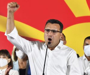 epa08548711 Leader of the ruling SDSM party Zoran Zaev (C) celebrates victory in the early Parliamentary election in Skopje, Republic of North Macedonia, 16 July 2020. Almost 51 percent of the 1.8 million Macedonians voted in early Parliamentary elections.  EPA/GEORGI LICOVSKI
