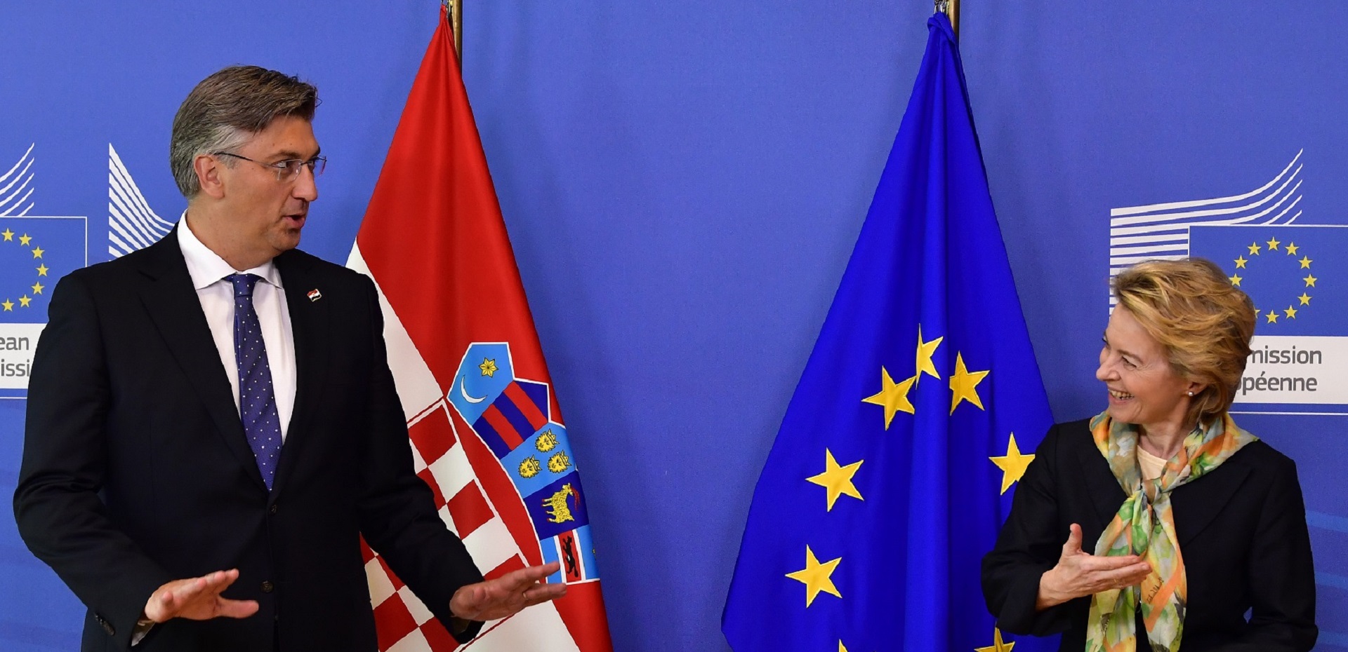 epa08549638 President of the European Commision Ursula von der Leyen (R) welcomes Croatian Prime Minister Andrej Plenkovic (L) before their bilateral meeting at the EU headquarters in Brussels, Belgium, 16 July 2020.  EPA/JOHN THYS / POOL