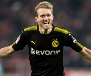 FILED - 02 February 2018, North Rhine-Westphalia, Cologne: Borussia Dortmund's Andre Schuerrle celebrates scoring his side's third goal during the German Bundesliga soccer match between 1. FC Cologne and Borussia Dortmund at the RheinEnergieStadion. German World Cup winner Andre Schuerrle has announced a surprise retirement from football aged just 29. Photo: Marius Becker/dpa