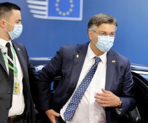 epa08553288 Croatia's Prime Minister Andrej Plenkovic (R) arrives for the second day of the European Council in Brussels, Belgium, 18 July 2020. European Union nations leaders meet face-to-face for the first time since February to discuss plans responding to the coronavirus crisis and new long-term EU budget at the special European Council on 17 and 18 July.  EPA/OLIVIER MATTHYS / POOL