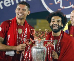epa08562321 Liverpool's Dejan Lovren (L) and Mohamed Salah celebrate the Premier League title following the English Premier League soccer match between Liverpool FC and Chelsea FC in Liverpool, Britain, 22 July 2020.  EPA/Phil Noble/NMC/Pool EDITORIAL USE ONLY. No use with unauthorized audio, video, data, fixture lists, club/league logos or 'live' services. Online in-match use limited to 120 images, no video emulation. No use in betting, games or single club/league/player publications.