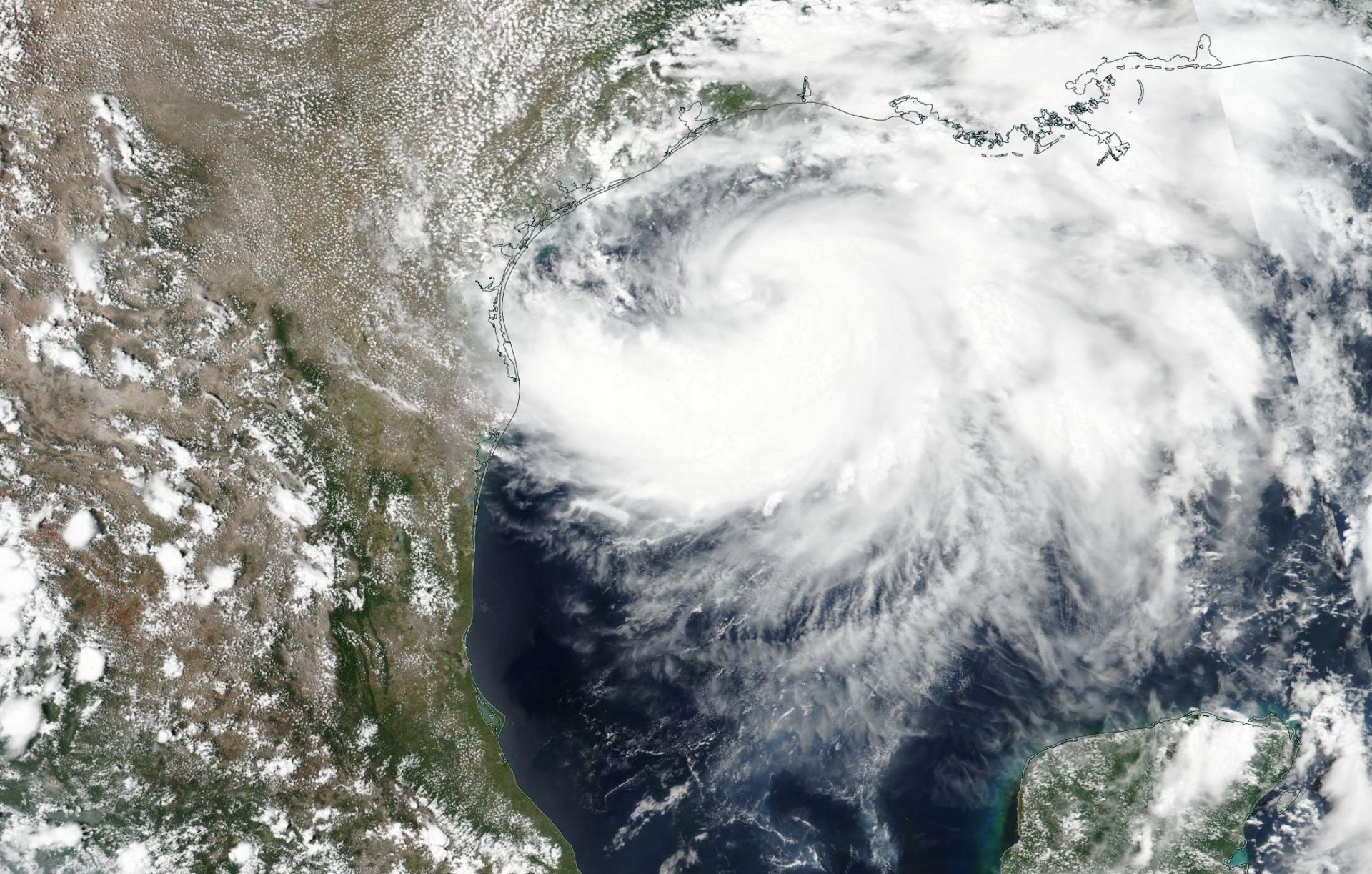 epa08565217 A handout satellite image made available by the National Aeronautics and Space Administration shows Tropical Storm Hanna as it moves trough the Gulf of Mexico and approaches Texas, 24 July 2020 (issued 25 July 2020). According to media reports, Tropical Storm Hanna is expected to reach hurricane strength upon making landfall in Texas by the eveing of 25 July local time.  EPA/NASA / HANDOUT  HANDOUT EDITORIAL USE ONLY/NO SALES
