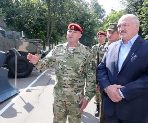 epa08570378 Belarus President Alexander Lukashenko (R) speaks with officers as he visits the Belarusian Interior Ministry special forces base in Minsk, Belarus, 28 July 2020. The presidential election in Belarus is scheduled to take place on 09 August 2020.  EPA/NIKOLAI PETROV  / POOL