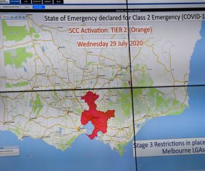 epa08571859 A map is displayed at the Victorian state control center, which is being used for the coronavirus pandemic, in Melbourne, Australia, 29 July 2020.  EPA/JOE ARMAO / POOL AUSTRALIA AND NEW ZEALAND OUT