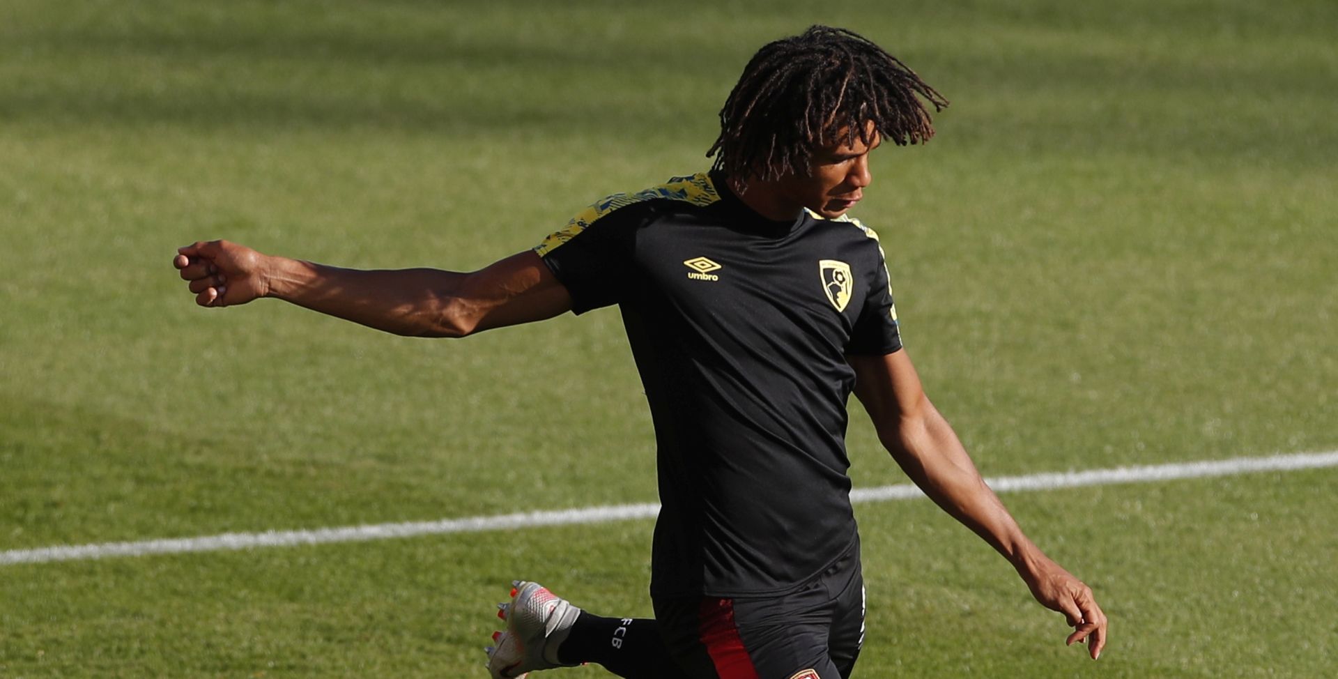 epa08542194 Bournemouth's Nathan Ake in action during the warm-up before the English Premier League match between AFC Bournemouth and Leicester City in Bournemouth, Britain, 12 July 2020.  EPA/Andy Couldridge/NMC/Pool EDITORIAL USE ONLY. No use with unauthorized audio, video, data, fixture lists, club/league logos or 'live' services. Online in-match use limited to 120 images, no video emulation. No use in betting, games or single club/league/player publications.