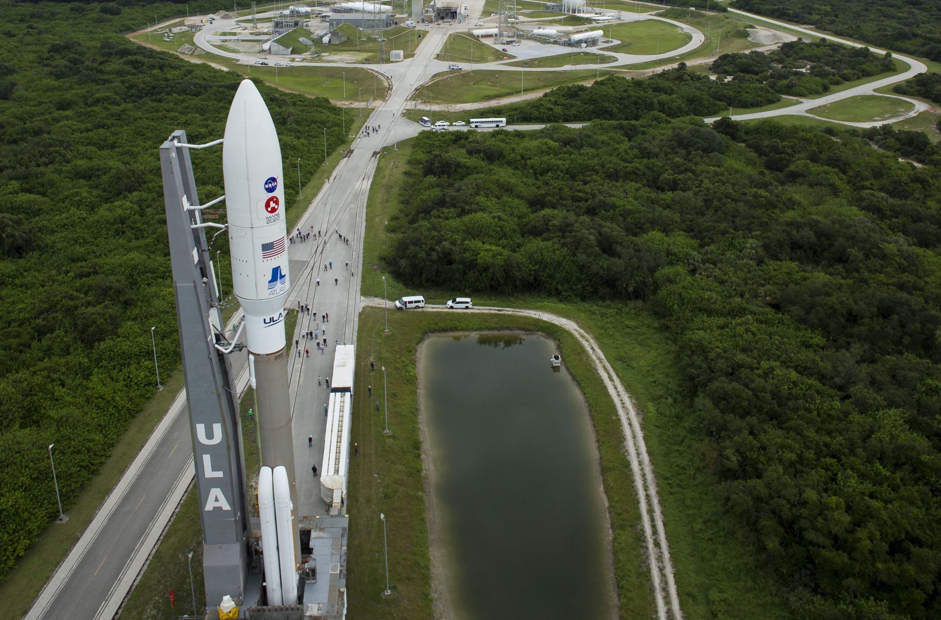 epa08571241 A handout photo made available by NASA shows a United Launch Alliance Atlas V rocket with NASA’s Mars 2020 Perseverance rover onboard as it is rolled out of the Vertical Integration Facility to the launch pad at Space Launch Complex 41, at Cape Canaveral Air Force Station in Florida, USA, 28 July 2020. The Perseverance rover is part of NASA’s Mars Exploration Program, a long-term effort of robotic exploration of the Red Planet. Launch is scheduled for 30 July.  EPA/NASA/Joel Kowsky HANDOUT MANDATORY CREDIT: (NASA/Joel Kowsky) HANDOUT EDITORIAL USE ONLY/NO SALES