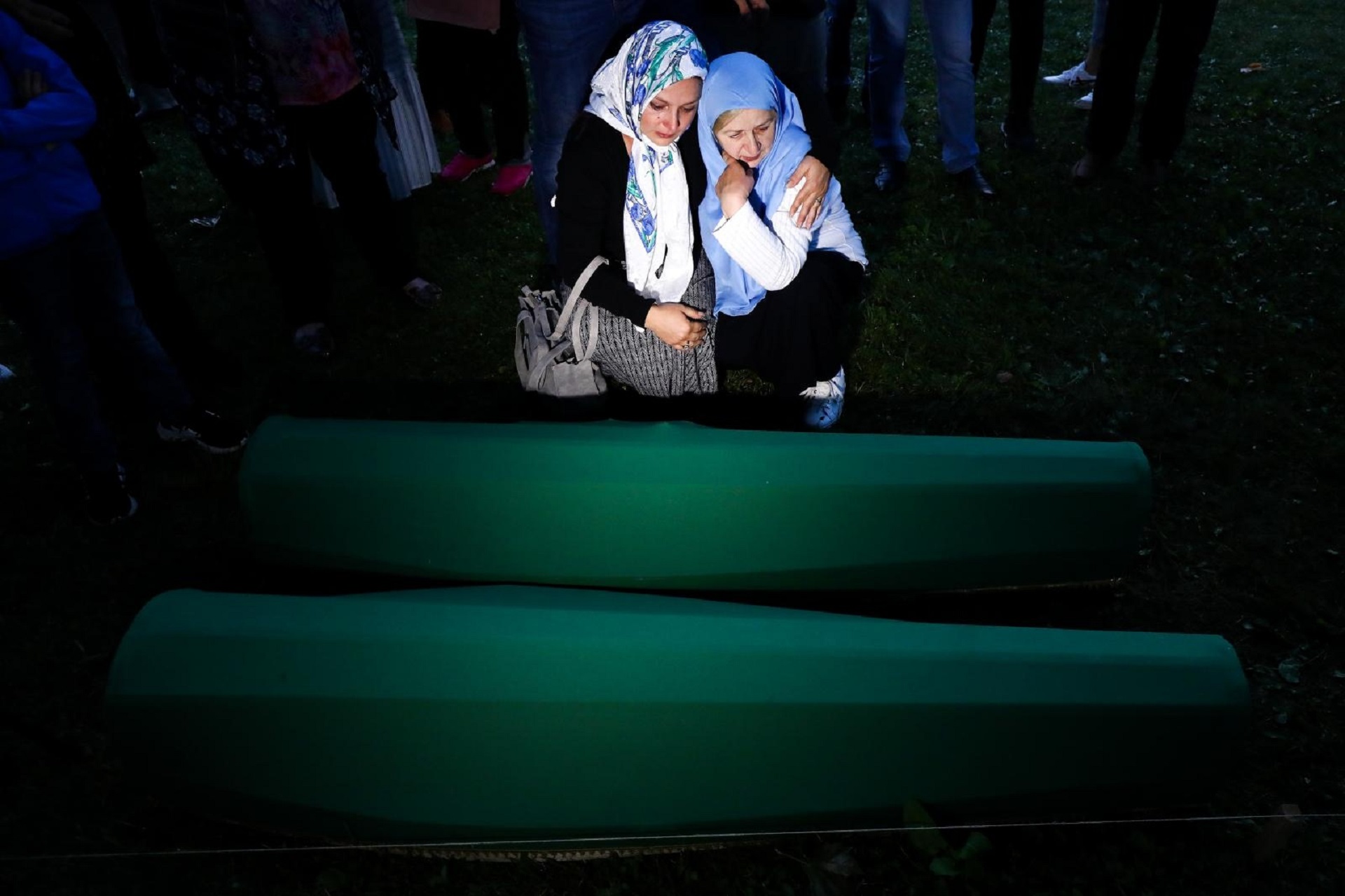 10.07.2019., Potocari, Bosna i Hercegovina - Tabuti s ostatcima 33 zrtve genocida izneseni iz tvornice akumulatora u musalu, gdje ce sutra biti pokopani. Photo: Armin Durgut/PIXSELL