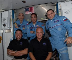 epa08568646 A handout picture made available by the National Aeronautics and Space Administration (NASA) shows newly-expanded Expedition 63 crew with NASA astronauts (front row, from L) Bob Behnken and Doug Hurley having just entered the International Space Station (ISS) shortly after arriving aboard the SpaceX Crew Dragon spacecraft, 31 May 2020 (issued 27 July 2020). In picture are NASA Commander Chris Cassidy (C, back row), flanked by Roscosmos Flight Engineers Anatoly Ivanishin (L) and Ivan Vagner (R). After two months aboard the International Space Station, astronauts Bob Behnken and Doug Hurley are planned to return home. The duo will undock with the SpaceX's Crew Dragon spacecraft from the ISS sometime on 01 August and then splashdown in the Atlantic Ocean on 02 August ending NASA's first crewed mission aboard a commercial spacecraft.  EPA/NASA HANDOUT  HANDOUT EDITORIAL USE ONLY/NO SALES