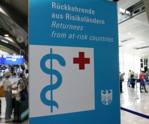 epa08585776 A view of an information sign of a Corona test center for returnees from risk countries at the international airport in Frankfurt am Main, Germany, 05 August 2020. Countries around the world are taking increased measures to stem the widespread of the SARS-CoV-2 coronavirus which causes the Covid-19 disease.  EPA/RONALD WITTEK