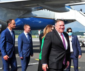 epa08600532 Slovenian Foreign Minister Anze Logar (L) welcomes US State Secretary Mike Pompeo (2-R), at the Joze Pucnik airport in Ljubljana, Slovenia, 13 August 2020. Pompeo is on an official one-day visit to Slovenia, second destination on his tour in four European countries.  EPA/IGOR KUPLJENIK