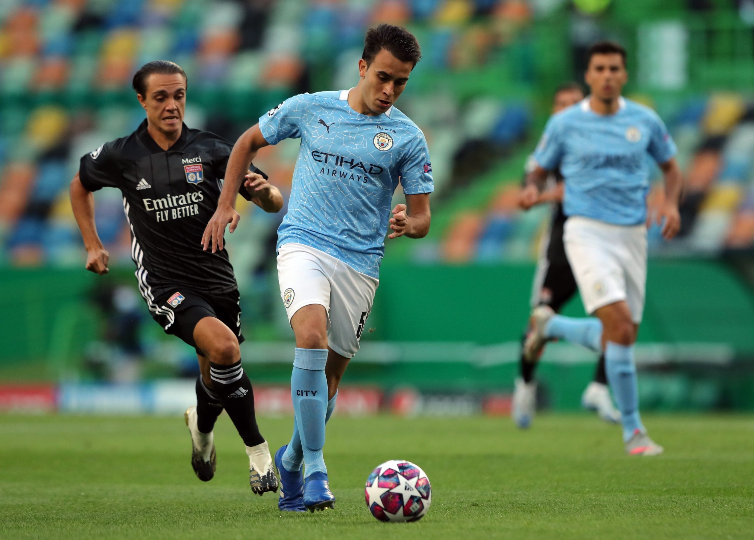 epa08606070 Eric Garcia of Manchester City (C) in action against Maxence Caqueret of Lyon during the UEFA Champions League quarter final match between Manchester City and Olympique Lyon in Lisbon, Portugal 15 August 2020.  EPA/Miguel A. Lopes / POOL