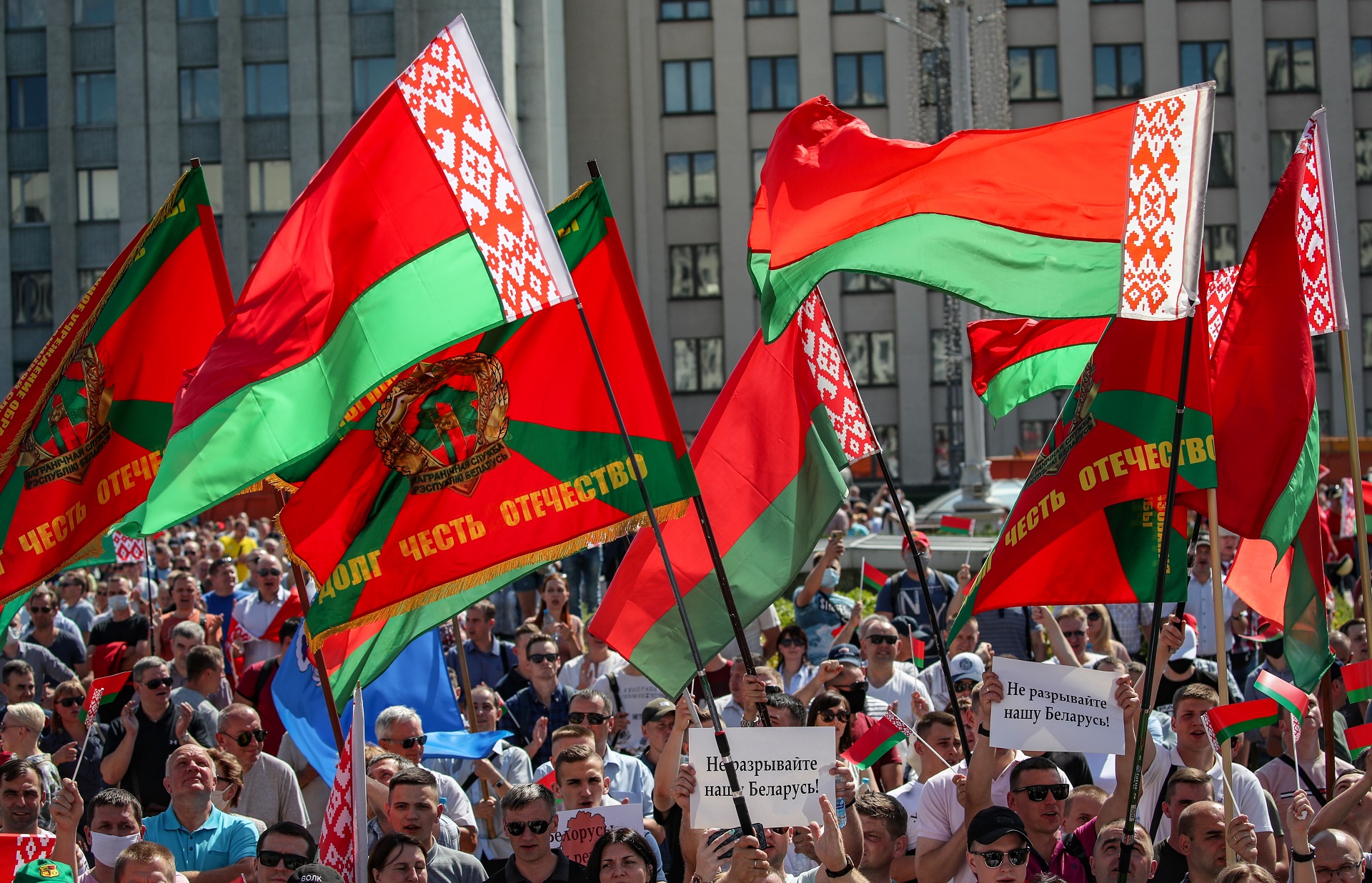 epa08606793 Supporters of Belarusian President Alexander Lukashenko wave national flags as they take part in a rally in Minsk, Belarus, 16 August 2020. Long-time President Lukashenko is under mounting pressure after unrest erupted in Belarus over alleged poll-rigging and police violence at protests following election results claiming that he won a landslide victory in the 09 August elections. As unrest continued in the country as of 15 August, Lukashenko sought the help of Russian President Vladimir Putin asking assistance in the event of external military threats to Belarus, media reported. Opposition leader Tikhanovskaya fled to Lithuania after rejecting the election results she claimed was rigged. Following the deathly crackdown on protesters, EU foreign ministers, during a video conference in Brussels on 14 August, approved sanctions against responsible officials in Belarus.  EPA/TATYANA ZENKOVICH