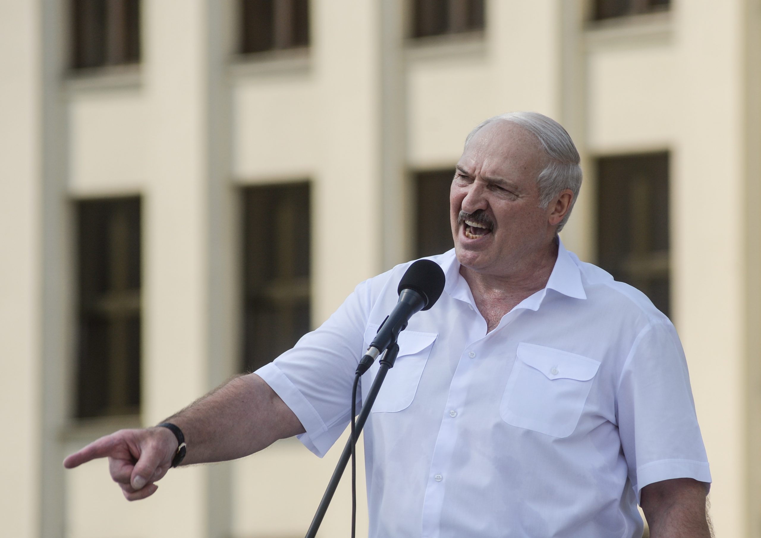 epa08606966 Belarusian President Alexander Lukashenko addresses his supporters during a rally in Minsk, Belarus, 16 August 2020. Long-time President Lukashenko is under mounting pressure after unrest erupted in Belarus over alleged poll-rigging and police violence at protests following election results claiming that he had won a landslide victory in the 09 August elections. As unrest continued in the country as of 15 August, Lukashenko sought the help of Russian President Vladimir Putin asking assistance in the event of external military threats to Belarus, media reported. Opposition leader Tikhanovskaya fled to Lithuania after rejecting the election results she claimed was rigged. Following the deathly crackdown on protesters, EU foreign ministers, during a video conference in Brussels on 14 August, approved sanctions against responsible officials in Belarus.  EPA/YAUHEN YERCHAK