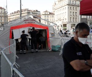 epa08609608 Firefighters wearing a protective face masks install a test station for Covid-19 coronavirus in Marseille, France, 17 August 2020. Marseille has been declared a zone of 'active circulation' for the Covid19 coronavirus, as cases surged in recent weeks.  EPA/GUILLAUME HORCAJUELO