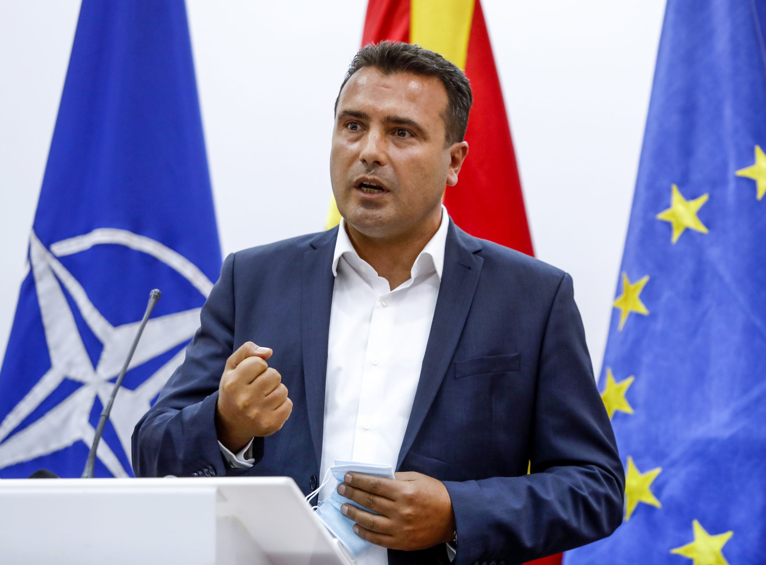 epa08610908 The leader of SDSM Zoran Zaev accompanied by the leader of DUI Ali Ahmeti (not on the picture) addressed the nation and announced that they have reached a deal for forming a new government in Skopje, North Macedonia, 18 August 2020.The Macedonian public was in suspense About who will form the new government because in the early parliamentary elections no party won a majority in the parliament. SDSM won the Macedonian block with 46 member spots in the parliament, while DUI won the Albanian block with 15 spots. The president Stevo Pendarovski gave the mandate for Prime Minister to the leader of SDSM Zoran Zaev who was successful in negotiating a deal with the leader of DUI Ali Ahmeti to form a majority in the parliament, which has 120 member spots in total. With this the two parties get to form a government which will lead the country in the next four years.  EPA/GEORGI LICOVSKI