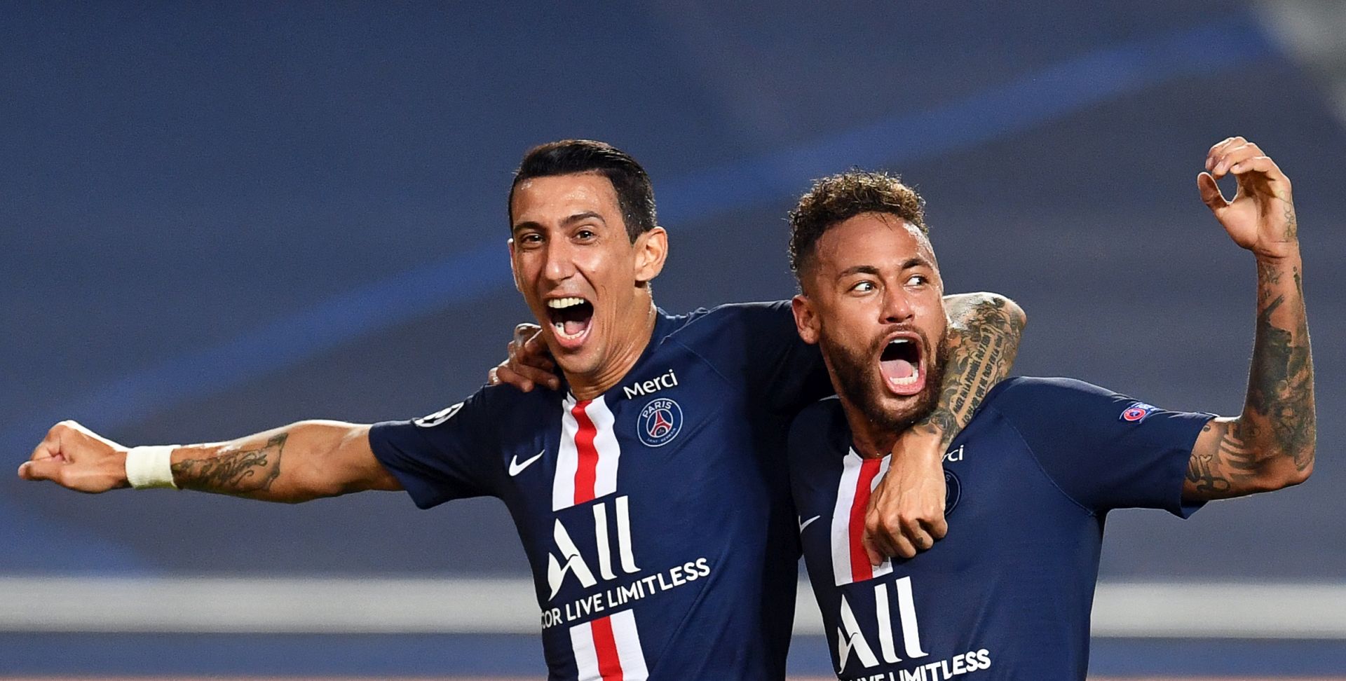 epa08611493 Angel di Maria (L) of PSG celebrates with teammate Neymar (R) after scoring the 2-0 lead during the UEFA Champions League semi final match between RB Leipzig and Paris Saint-Germain in Lisbon, Portugal, 18 August 2020.  EPA/David Ramos / POOL