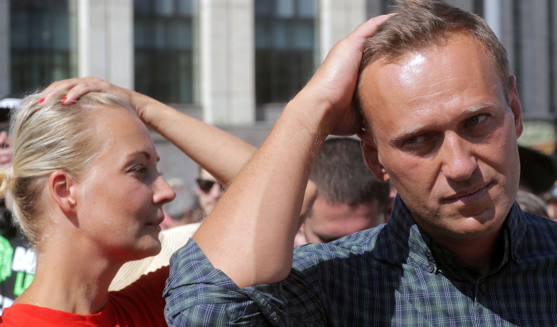 epa08613913 (FILE) - Russian liberal opposition leader and a head of an anti-corruption foundation, Alexei Navalny and his wife Yulia attend a rally against pension age increase in Moscow, Russia, 29 July 2018 (reissued 20 August 2020). Navalny's spokeswoman Kira Yarmysh said on social media on 20 August that the opposition leader and critic of President Vladimir Putin was taken to hospital for alleged poisoning after he started feeling unwell during a flight from Siberia to Moscow. The plane made an emergency landing in the city of Omsk.  EPA/MAXIM SHIPENKOV
