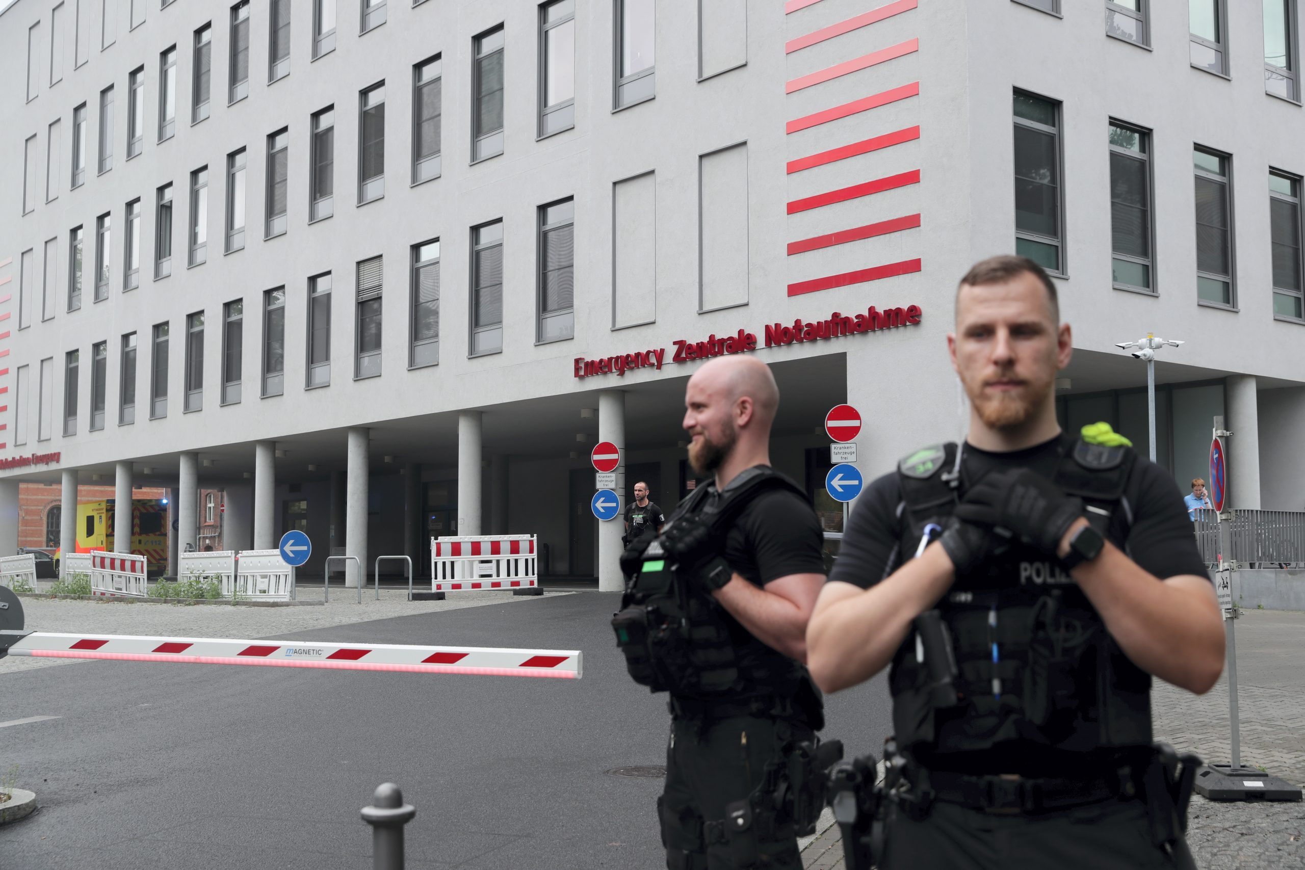 epa08617728 Police guard the entrance of Russian opposition activist as Alexei Navalny (not pictured) arrives at Charite Campus Mitte hospital in Berlin, Germany, 22 August 2020. Navalny was first placed in an hospital in Omsk, Russia, after he felt bad on board of a plane on his way from Tomsk to Moscow. The flight was interrupted and after landing in Omsk Navalny was delivered to hospital with a suspicion on a toxic poisoning. The hospital management agreed on 21 August 2020 to transport Navalny to a German hospital for further treatment.  EPA/HAYOUNG JEON
