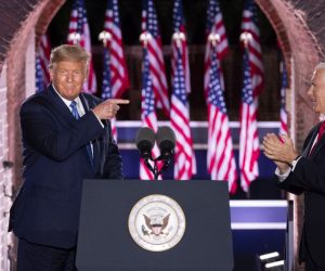 epa08628204 US President Donald J. Trump (L) points to Vice President Mike Pence (R) as he arrives on stage after Pence delivered remarks on the third night of the Republican National Convention, at Fort McHenry in Baltimore, Maryland, USA, 26 August 2020.  EPA/KEVIN DIETSCH / POOL