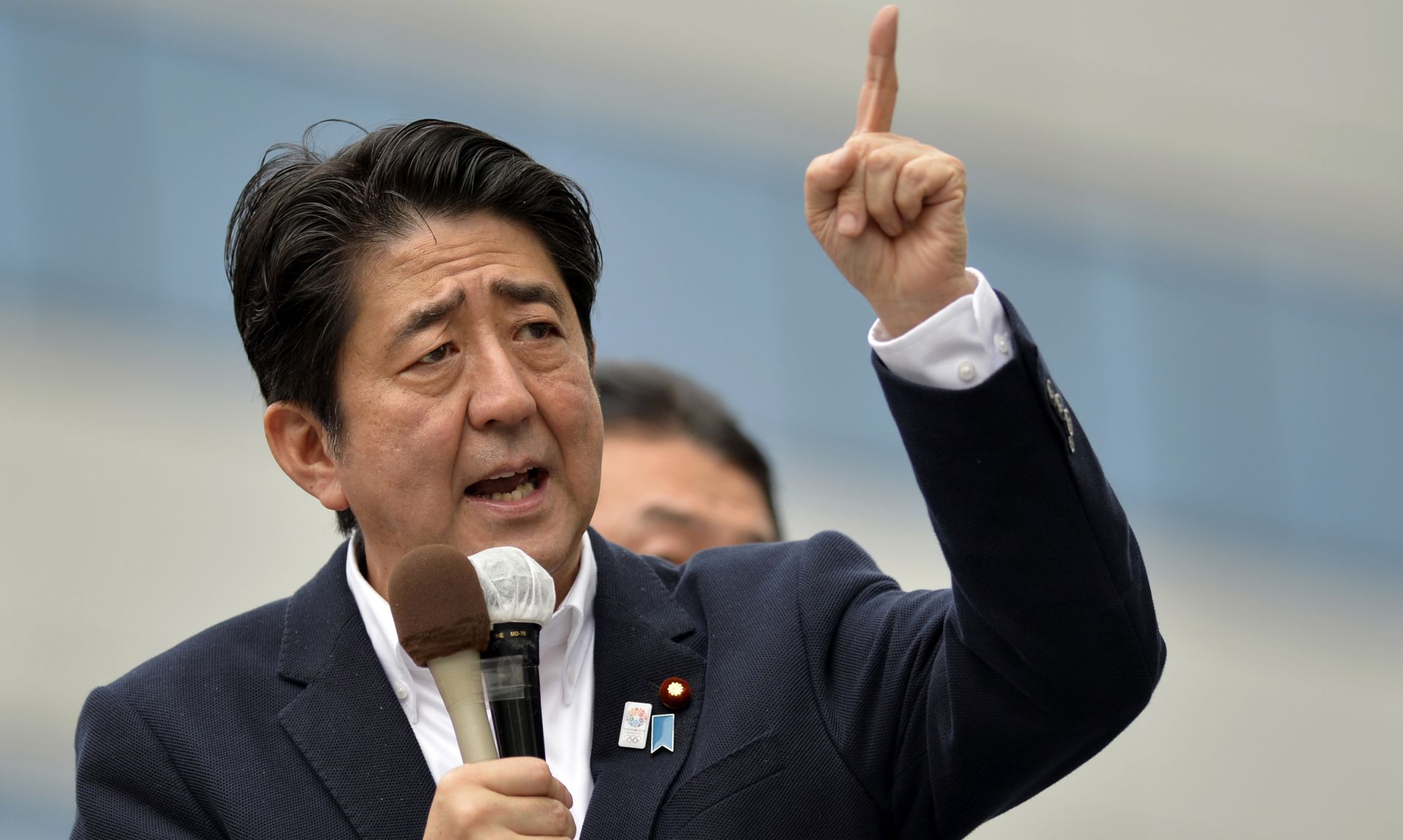 epa08630776 (FILE) - Japan's Prime Minister and leader of the ruling Liberal Democratic Party Shinzo Abe speaks to voters from the roof of a campaign van in Tokyo, Japan, 04 July 2013 (re-issued 28 August 2020). Abe is reportedly about to announce his resignation as prime minister on 28 August 2020.  EPA/FRANCK ROBICHON *** Local Caption *** 50904293