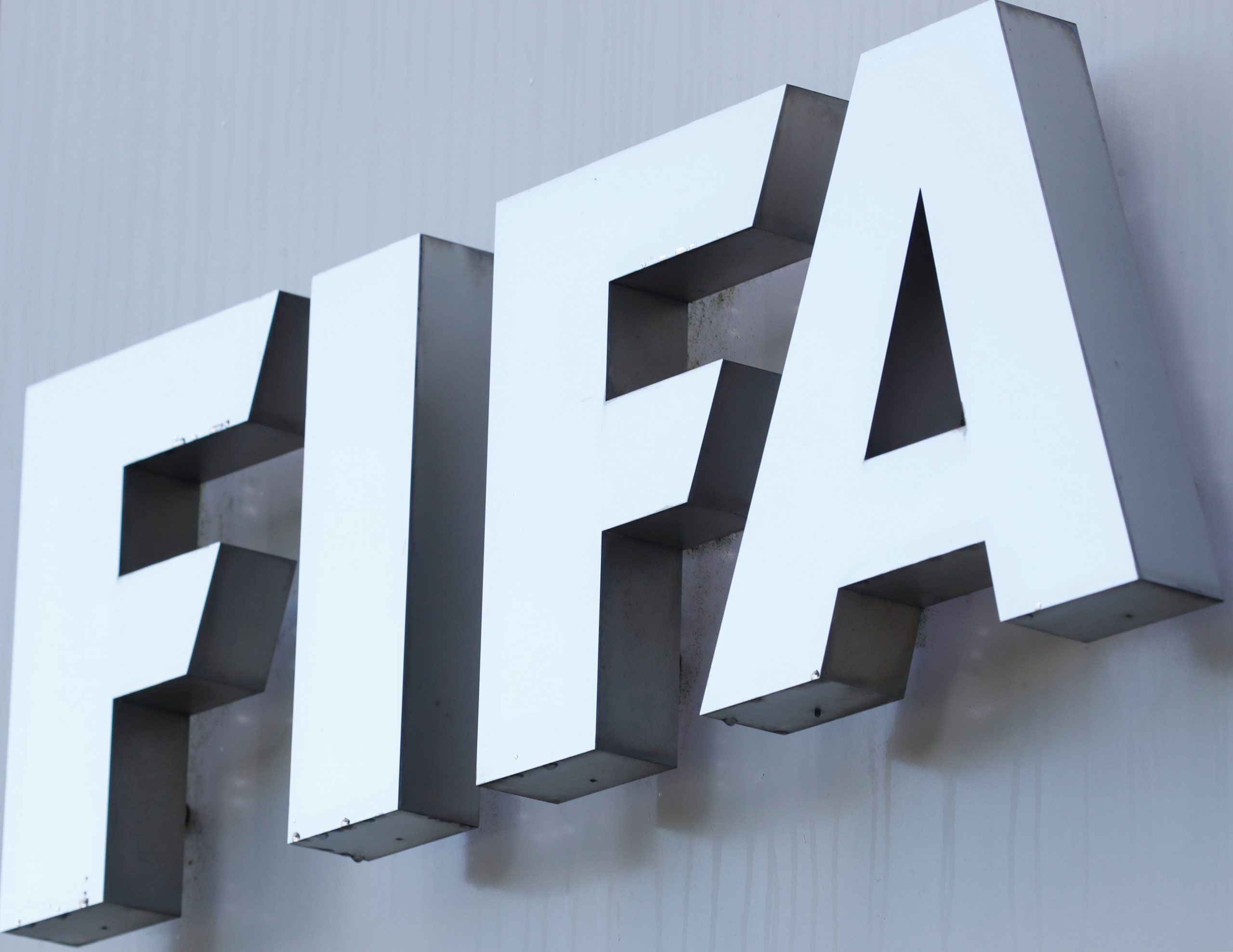FIFA's logo is seen in front of its headquarters in Zurich FIFA's logo is seen in front of its headquarters in Zurich, Switzerland August 5, 2020. REUTERS/Arnd Wiegmann ARND WIEGMANN